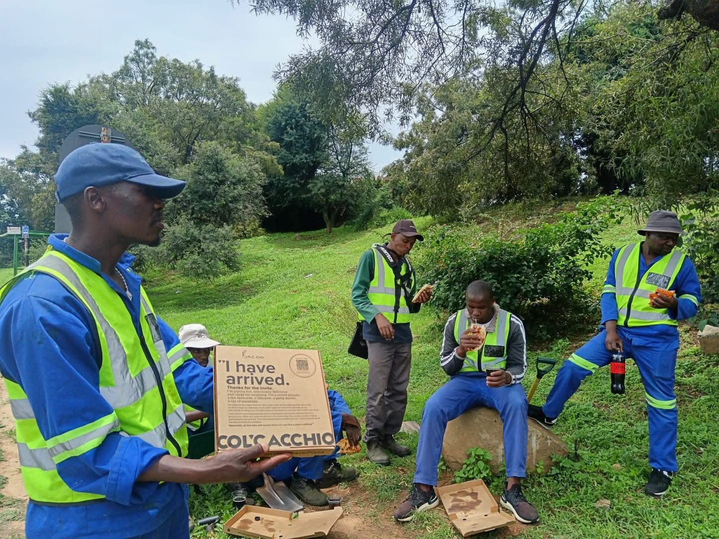 Team lunch break during cleanup